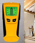 No Frills Dead On Wall Scanner And Precision Stud Finder Plus Ac Voltage Detector displayed on wall, showing digital interface for stud detection.