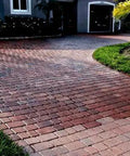 Curved patio of red and beige pavers showcasing high gloss shine after using Tough As Nails Silicone Concrete Sealer Gives A Knockout High Gloss Shine To Patios And Driveways Includes A Heavy Duty 5 Gallon Kit To Battle Road Salt Lock Sand In Place And Keep Surfaces Slip Resistant For Years.