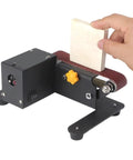 Mini Belt Sander Electric Bench Grinder With 7 Speed Settings For Woodworking And Metal Polishing Compact Desktop Sanding Machine in use with a wooden block.