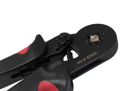 Close-up of Self Adjusting Ratchet Ferrule Crimping Tool Kit with red and black pliers showing crimping mechanism