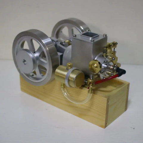 Kickstart Your Engineering Quest With This Slick Six Cubic Centimeter Hit And Miss Gasoline Engine Featuring Water Cooling And A Precision Flywheel Speed Limiter On A Solid Wood Base.