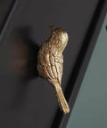 Brass Bird Knob Door Handle for Cabinets and Drawers, Solid brass kitchen cupboard pull in soft luster on black cabinet