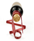 Wine Bottle Holder Rack For Cabinet And Table Decor with red metal frame displaying a wine bottle horizontally