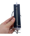 Hand holding Heating Block 220V Replacement Part For Water Dispenser, Coffee Machine, And Dishwasher - Durable, Easy Install, Reliable Heater Element For Quick Appliance Repair And Steady Hot Water, blue