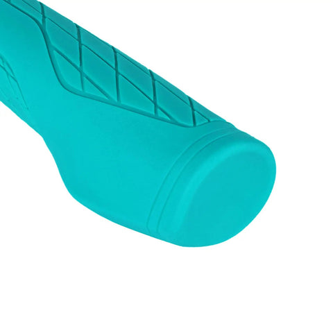 Close-up of turquoise ergonomic mountain bike grips with palm pad for all day comfort and pain relief, non slip lock on handlebar grips.