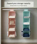 Upgrade Closet Game With This Heavy Duty Double Sided Hanging Wardrobe Organizer Packing Deep Side Pockets For Shoes And Gear To Instantly Boost Vertical Storage Capacity While Keeping Bedrooms Clean And Stress Free All Year. Two-layer closet organizers in pink and blue with folded clothes and bags.