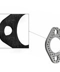 Close-up of an exhaust gasket included in the Exhaust Kit With Nuts Gasket And Studs For GMB139 Engine Fits 50cc To 150cc Scooters ATVs Go Karts Mopeds Compatible With GY6 Motors Ideal For Daily Rides And Weekend Projects Ride Ready Performance Durable Stainless Steel Construction Easy Install