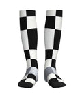 High Performance Unisex Athletic Compression Socks Featuring Graded Ankle Support Breathable Moisture Wicking Fabric Black White Piano Plate Grid Design.