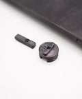 Throat Plate Insert With Zero Clearance For Skil TS6307 Table Saw Delivers Cleaner Cuts And Reduced Tearout With Precise Fit Fast No Sweat Install Using Included Cap And Fasteners And Durable Heat Treated Construction shown with cap and fasteners.