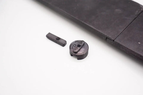 Throat Plate Insert With Zero Clearance For Skil TS6307 Table Saw Delivers Cleaner Cuts And Reduced Tearout With Precise Fit Fast No Sweat Install Using Included Cap And Fasteners And Durable Heat Treated Construction shown with cap and fasteners.