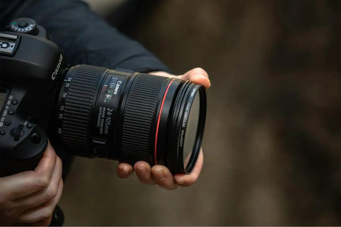 Slim 67mm Circular Polarizer Filter for Camera Lenses with Glare Reduction on a lens, enhancing edge to edge clarity, outdoor photography.