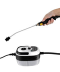 Person holding nozzle of Powerful Handheld Steam Cleaner 2500W High Temperature Steam For Car Carpets Upholstery Leather and Windows Deep Dirt