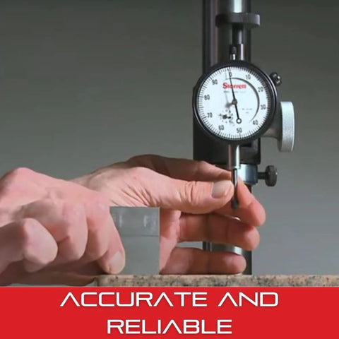 Starrett dial test indicator with white-face dial, back plunger, 1/4 in shank for mounting; front view