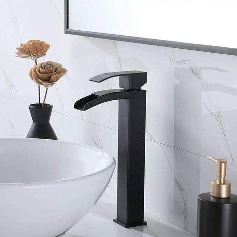Dope Sleek Black Vessel Sink Faucet With Waterfall Spout And Single Handle, shown installed with pop-up drain in modern bathroom.