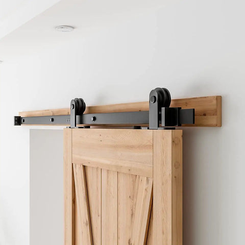 5 Ft Top Mount Sliding Barn Door Hardware Kit For 26 To 30 Inch Doors installed on wooden door with black rail