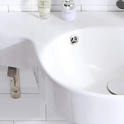 Slick Ceramic Wall Mounted Bathroom Sink With Deep Corner Basin and Standalone Pedestal Base for quick clean up, showing smooth glaze and drain.