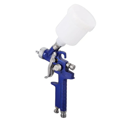 Heavy Duty Gravity Feed Hvp Paint Sprayer with 1.0mm Brass Tip and top-mounted cup for precision painting.