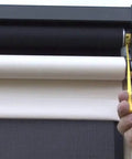 Adjusting AM25 12V DC Tubular Roller Blind Motor With Built In Limit Switch using Allen wrench, showing installation for RV shades.