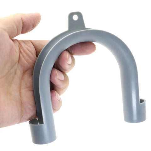 Person holding Washer Drain Hose Guide Mounting Bracket U Shape Replacement Part For WH41X10133, durable gray plastic