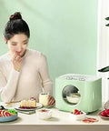 Electric Food Dehydrator With Badass Stainless Steel Trays And Sick 360 Hot Air Circulation For Dried Fruit Veggies And Beef Jerky with user enjoying snacks.