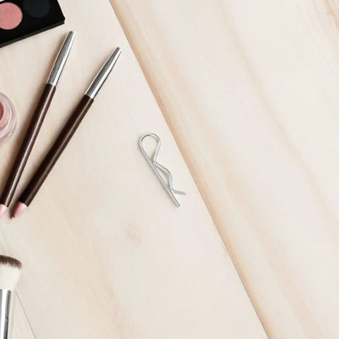 Stainless Steel Cotter Pins That Don't Loose Up: R Shape Fasteners With Wavy Design For Heavy Duty Mechanical Assembly And Industrial Hitch Stability on a wooden surface.