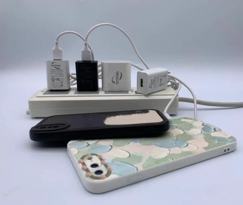 Universal Wall Charger Cube 5V 1A USB Power Adapter Fast Charge Plug for iPhone Samsung Galaxy LG and More Travel Ready Compact Charging Brick Single USB Port On The Go on power strip with smartphone cases.