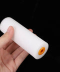 Hand holding a white foam sleeve refill for wall painting, part of Ten Hella Smooth Wall Painting Rollers.