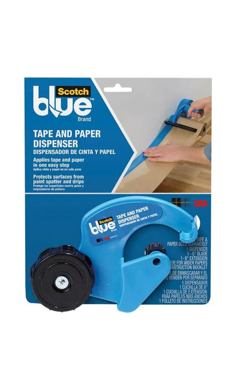 Painter's Tape And Paper Dispenser For Fast Surface Protection with plastic blade, shown in packaging on wood surface