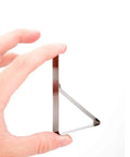 Hand holding one of 12 Pack Picnic Tablecloth Clips For Outdoor Tables, Heavy Duty Metal Cloth Clamps, measuring about 3 x 1.77 x 0.47 inches.
