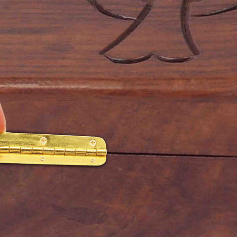 Pro Grade Mini Hinges 24 Pack Golden Finish 2 56 By 0 59 Inch Smooth Motion Hardware on wooden surface for cabinet use.