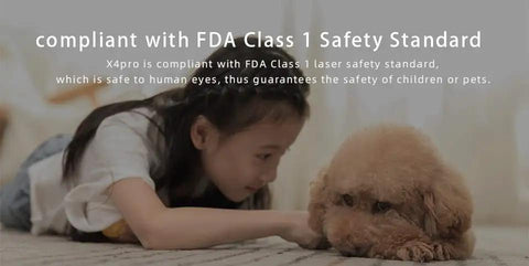 Child and dog on floor, compliant with FDA Class 1 laser safety standard, ensuring safety for humans and pets.