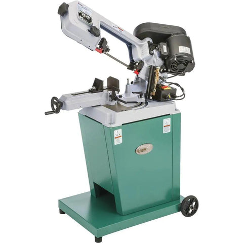Badass Metal Cutting Bandsaw With Swivel Head And Five By Six Inch Cutting Capacity Powered By Rock Solid Half Horsepower Motor Running Clean On 110V Or 220V For Smooth Shop Chores