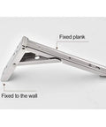 2 Piece Heavy Duty Folding Shelf Brackets Wall Mount showing stainless steel construction and installation on wall for wood support.