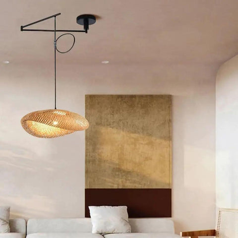 Chandelier Adjustable Hanging Light Fixtures, Modern Swing Arm Pendant,1 Long for Dining Room Kitchen Island Matte Black Finish(23.6in) in a stylish living room.