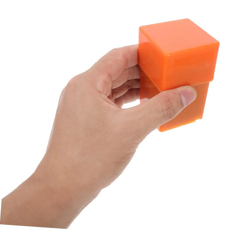 Hand holding orange case for Dope 37 Piece Metal Stamping Kit With Letter Numbers Heart Punches For Wood Plastic And Crafting