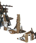 Damaged building terrain piece from the Bolt Action Battle of the Bulge Starter Set For Adults A Complete Tabletop World War II Strategy Wargaming Kit