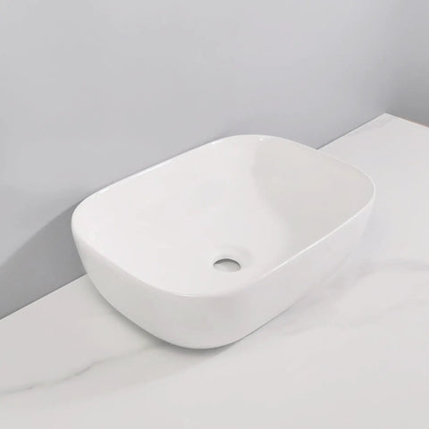 USZWBY Vessel Sinks Bathroom Simple Ceramic White Above Counter Wash Basin Rectangular Modern Art Bathroom Bowl Sink on countertop.