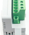 New 2085 IM8 Input Module For PLC Systems 2085IM8 Sealed In Box, top view of green connectors and gray casing for industrial automation.