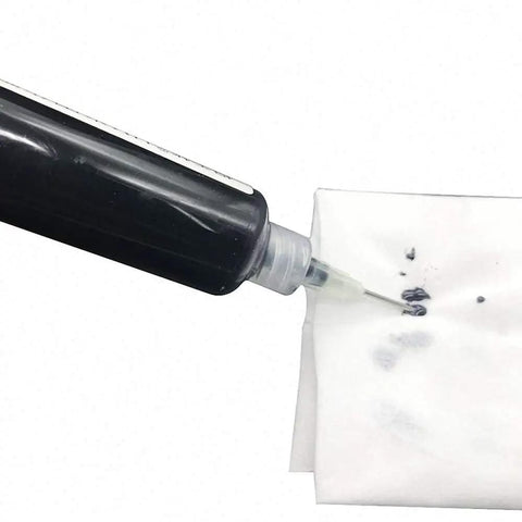 Pro Grade 10ML Black UV Solder Mask Kit With 1 Needle And Push Tool for PCB BGA work, shown dispensing black solder paste
