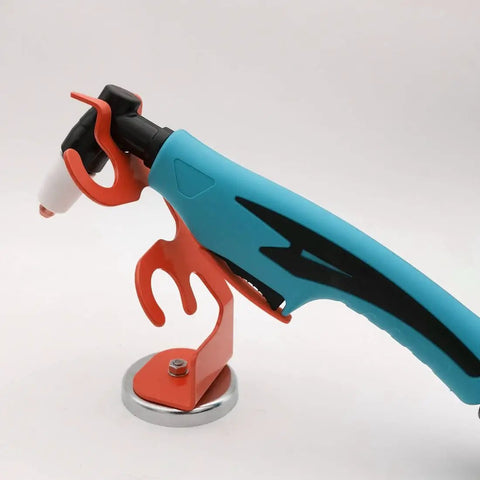 Magnetic TIG Torch Holder with Heavy Duty Base for Welding, built to last sturdy magnetic mount holding blue torch on steel surface.