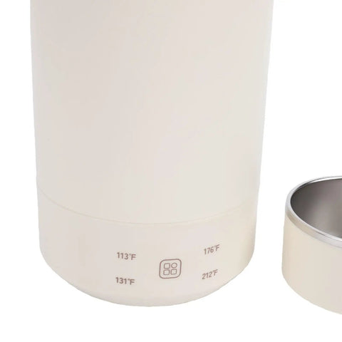 Portable Electric Water Boiler Kettle Slick One Liter with precise temp dial indicating temperature settings.