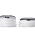Electric Food Dehydrator With Four Stackable Trays And Top Mounted Fan, compact design with mesh screens for drying snacks.