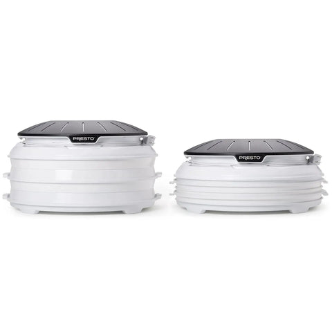 Electric Food Dehydrator With Four Stackable Trays And Top Mounted Fan, compact design with mesh screens for drying snacks.