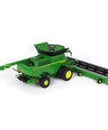 Prestige X9 1100 Farm Style Combine With Die Cast Body And Clear Windows, dual front wheels, folding C16F corn head, model view.