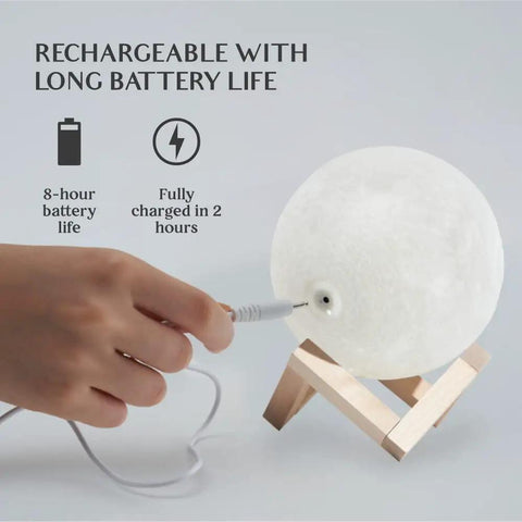 Large Moon Lamp 7.1-Inch With Wooden Base being charged, demonstrating rechargeable feature, on white background.