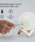 7 Inch Moon Lamp With 16 Color Options And 148 Modes Remote Or Touch Control Rechargeable Led Night Light being charged
