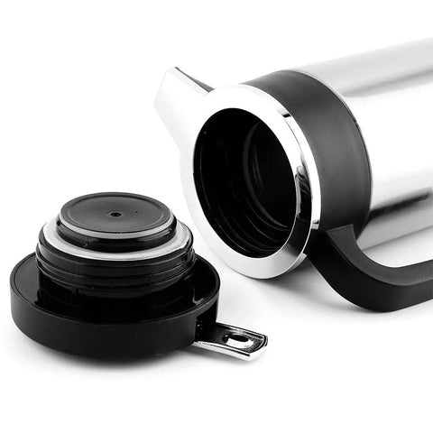 Close-up of the lid and spout of Road Ready Setup 1000 Milliliter Stainless Steel 12 Volt Car Kettle for hot brews.