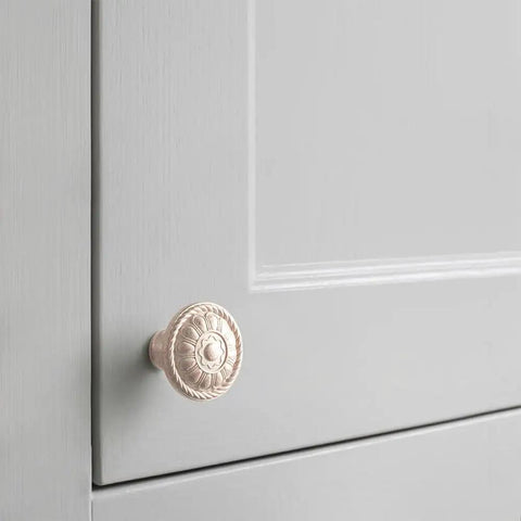 Heavy Duty Zinc Alloy Cabinet Knobs And Pulls Feel Dang Solid Antique Cream Copper Finish on grey cabinet door.