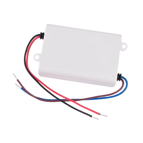 Plug And Play 24 Volt Dc Industrial Power Supply Providing 12 Watt Output And Slick Overload Protection For Automation Control Systems With Top Shelf Sturdy Build Quality in white enclosure with wires.