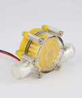 Water Turbine Micro Hydroelectric Power Generator For DIY Off Grid Charging LED Lighting And Devices DC Up To Eighty Volts Ten Watt Output No Internal Regulator Great For Charging Small Batteries And Phones, compact yellow and clear casing